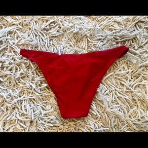 Sexy little red bikini bottom. Slight wear and still good quality.